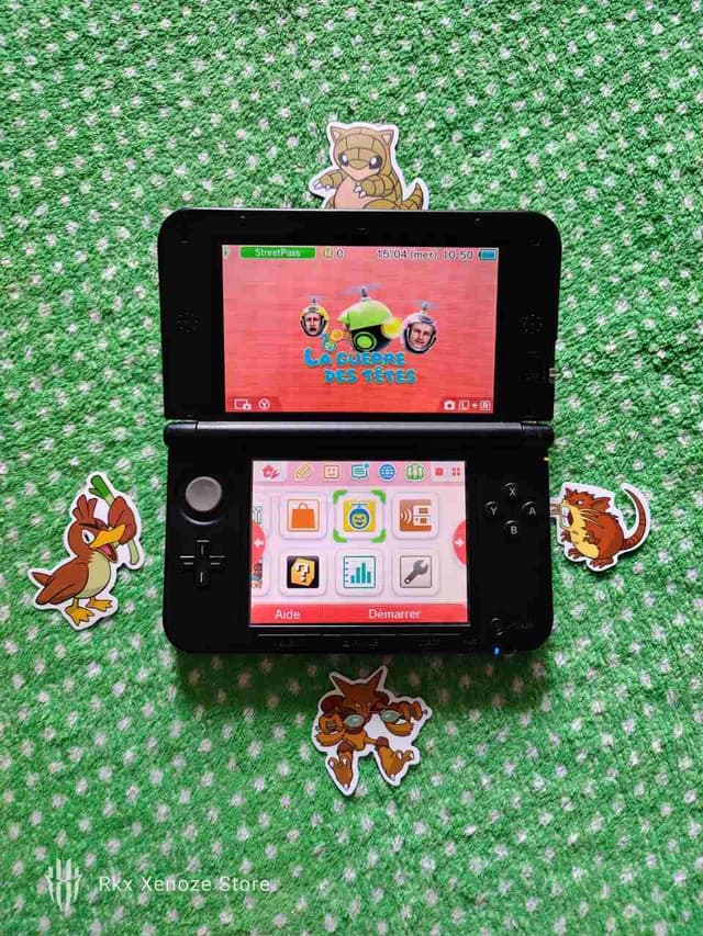 Nintendo 3ds XL cracker + 80 jeux