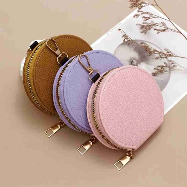 Porte-monnaie en cuir PU pour femme style portable rond.