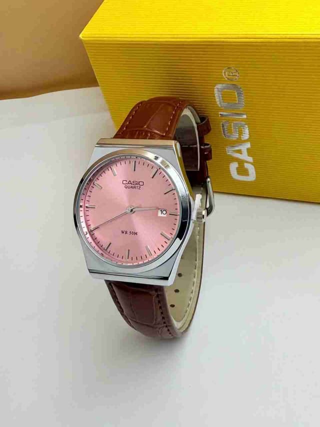 CASIO MONTRE HOMME  - FOND ROSE