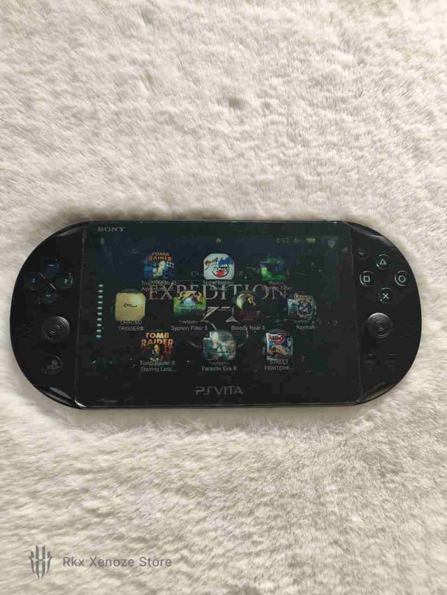Ps vita importé cracker + 60 jeux